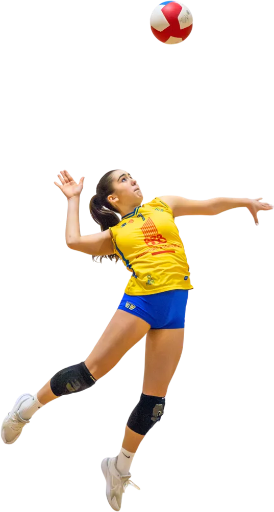 Atleta de voleibol da ADB a atacar a bola